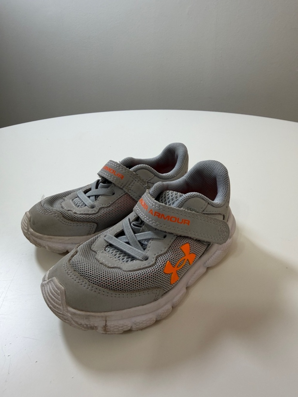 Under Armour Kids Gray Sneakers with Orange Logo Accent